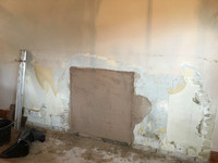 Plastering to old fireplace completed